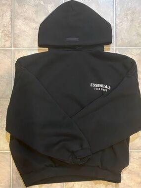 Essentials Black Hoodie with White Chest Logo